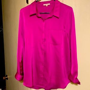 Long sleeve hot pink button down blouse.